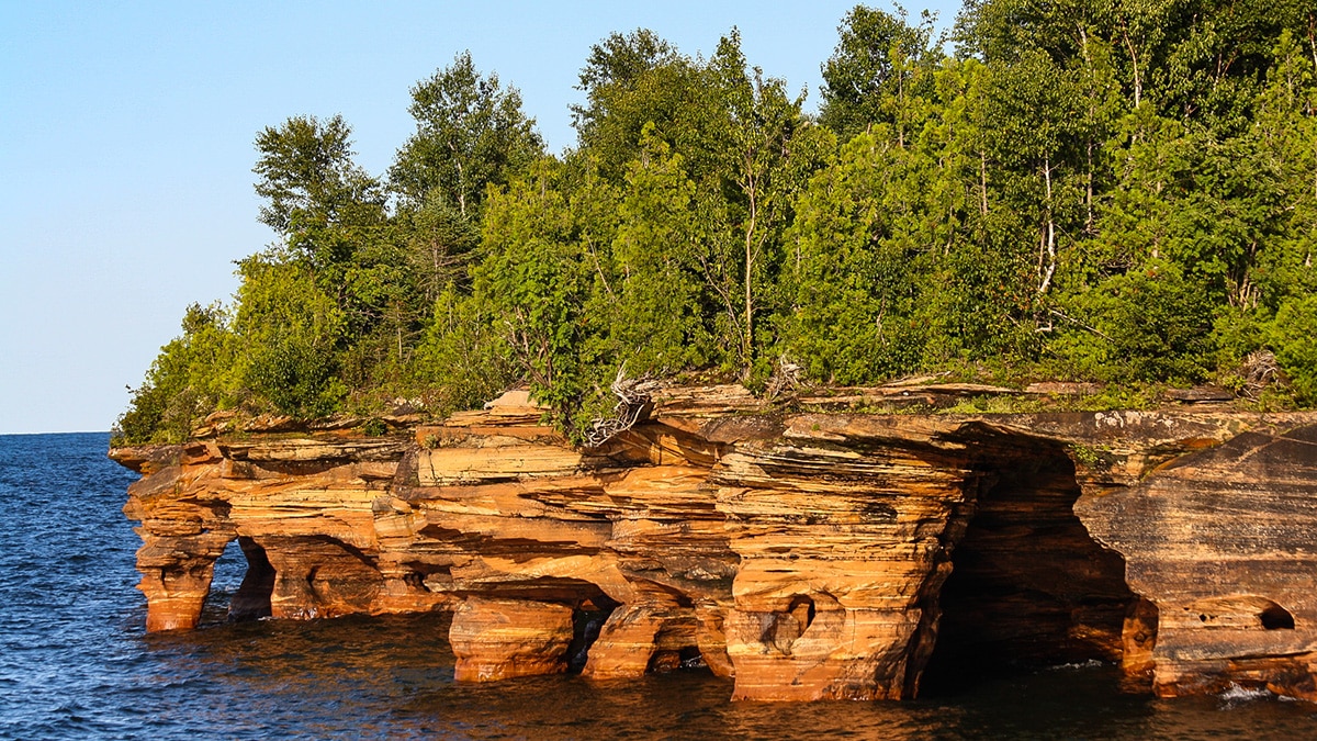 Majestic rock formation amidst the beauty of Apostle Islands National Lakeshore.