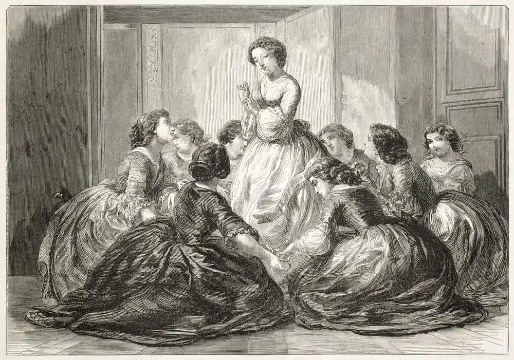 A group of women engrossed in a game of charades, sitting around a central woman in an intriguing engraving