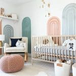 A vibrant baby's room with a colorful crib