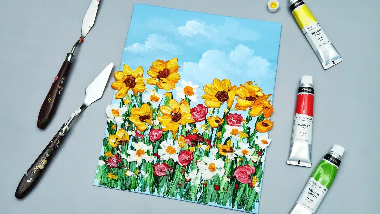 Floral painting with brush, showcasing the Pros and Cons of Acrylic Paint