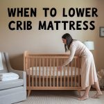 when to lower crib mattress